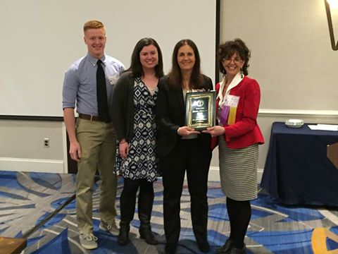 Dr. Marcie Taylor-Thoma, President of MSCSS, presents CCT professor Dr. Diana Owen with the Daniel Roselle Award